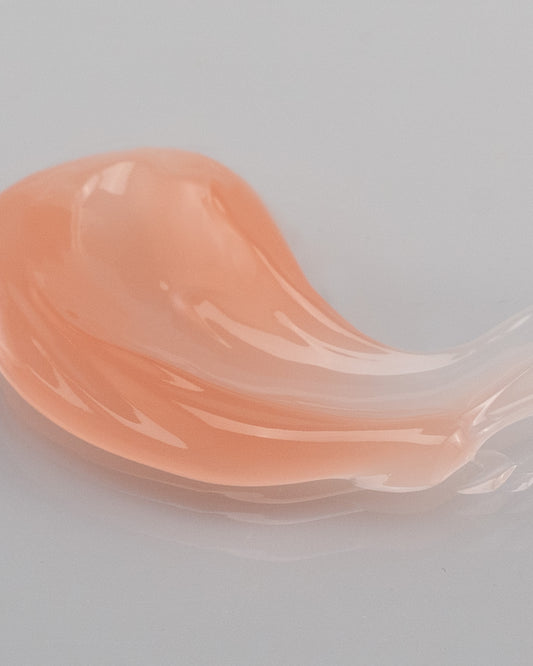 The Lip Filler, the iconic lip balm, mask and gloss by DF18+, shown in its gelly texture.